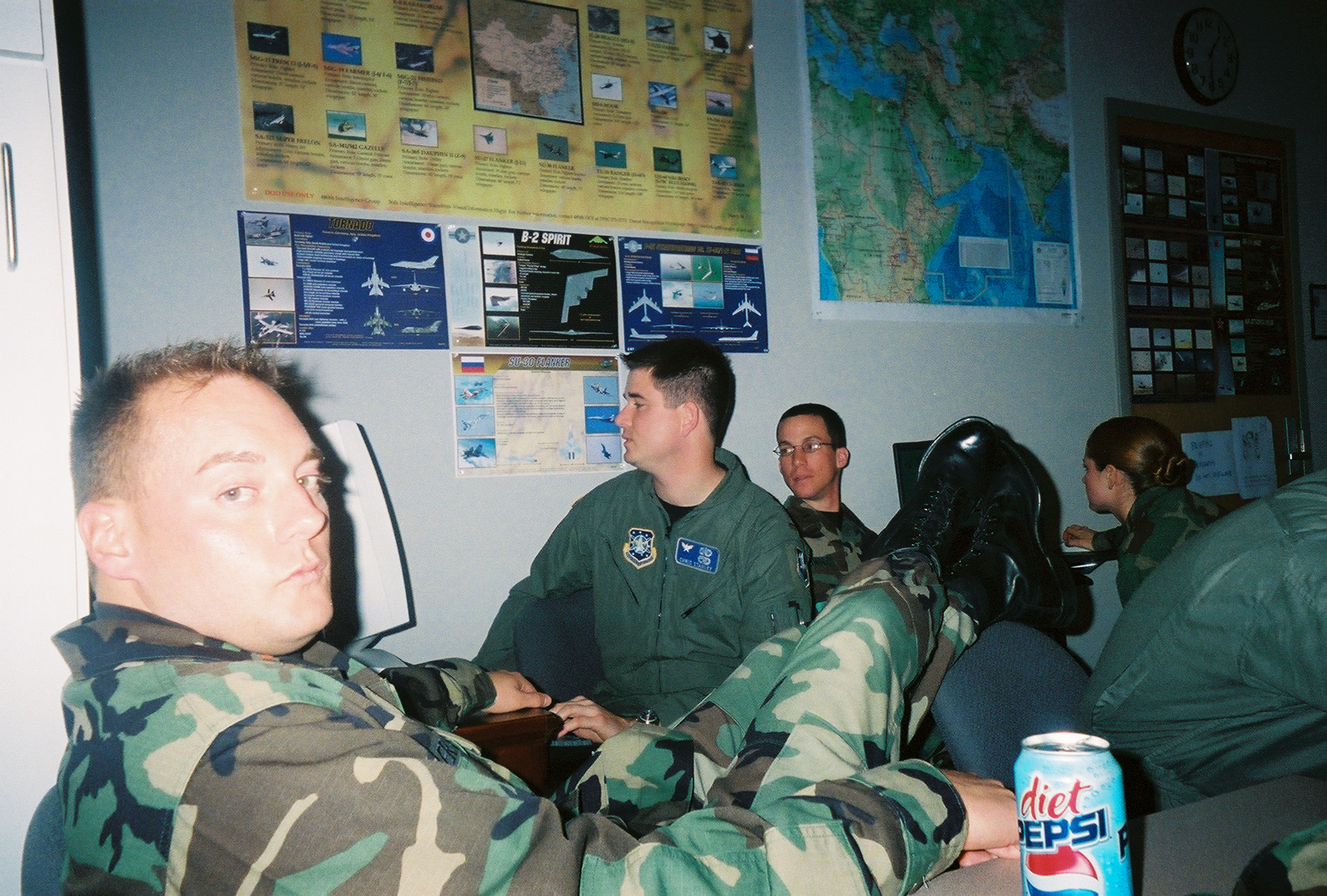 Your tax dollars in action!, Drenth (center, flight suit) checking up on latest dlogs