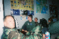 Your tax dollars in action!, Drenth (center, flight suit) checking up on latest dlogs